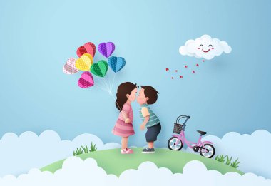 Kız ve erkek bebek öpüşüyor.