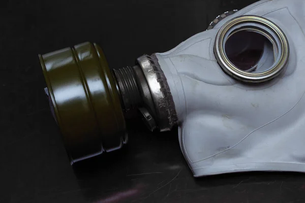 Gas mask with filter for survival in the environment of polluted air. Protection against virus infection. Equipment to protect the lungs.