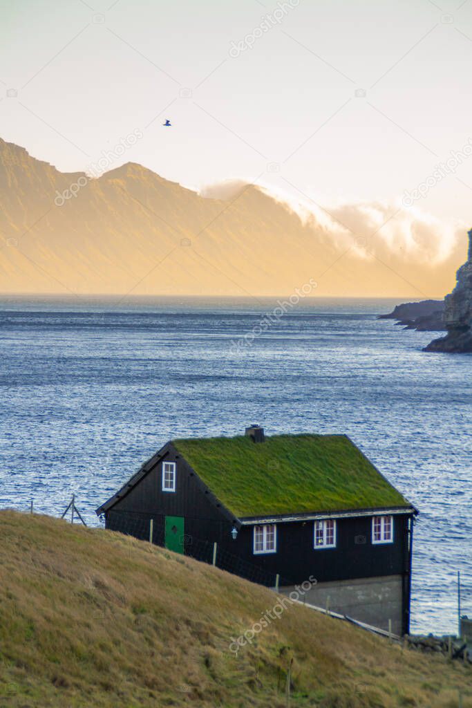 Scenic panorama golden hour view of breathtaking landscape in Stroymoy Island, Faroe Islands