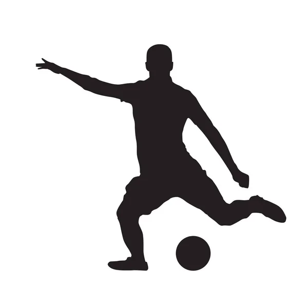 Футболист пинает мяч, изолированный векторный силуэт — стоковый вектор