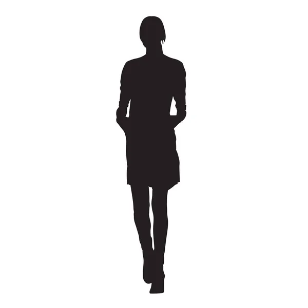 Jeune femme mince marchant en manteau de printemps. Les mains dans les poches. Isolat — Image vectorielle