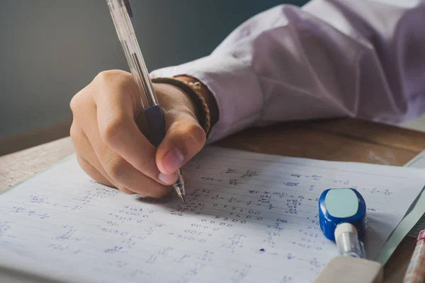 Hand and writing during the exam of a student. — Stock Photo, Image