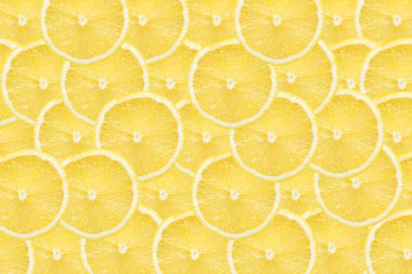 Limon arka planı keser. Sarı meyve kesimi dokusu. Citrus kesiti deseni. Canlı renk yaz tasarımı.