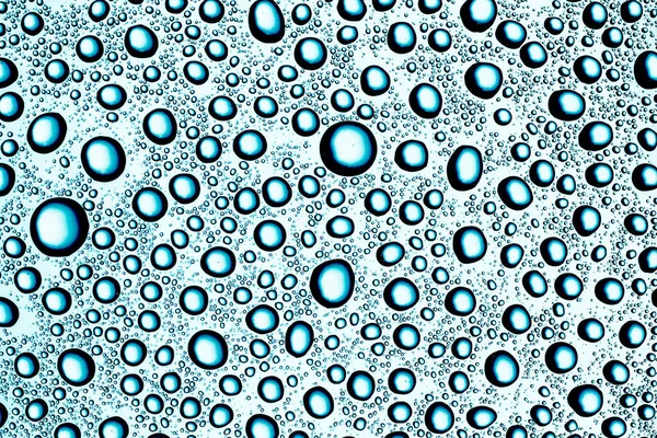 青い水が落ちる ぬれた表面の背景 色の雨露の質感 完璧な丸い水の泡のパターン — ストック写真