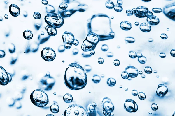 Vatten Droppar Blå Bakgrund — Stockfoto