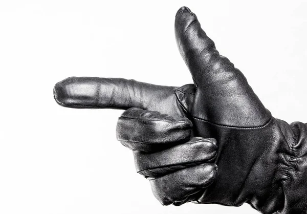Mężczyzna Ręka Czarny Skóra Rękawica Pokazując Wskazujący Palec Biały Tło — Zdjęcie stockowe