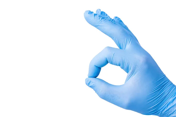 Mužská Ruka Modré Latexové Rukavici Ukazující Ceduli Prsty Bílém Pozadí — Stock fotografie