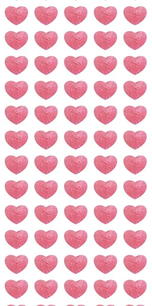 Herzmuster mit rosa Struktur auf weißem Hintergrund. — Stockfoto