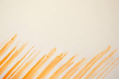 Sarı soyut elle boyanmış fırça darbesi arkaplanı kağıt üzerine