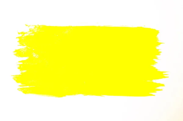 Pincel amarillo abstracto pintado a mano trazo daub fondo sobre papel — Foto de Stock
