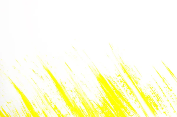 Yellow abstract hand-painted brush stroke daub background over paper — 스톡 사진