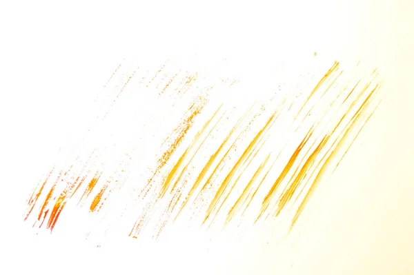 Yellow abstract hand-painted brush stroke daub background over paper — 스톡 사진