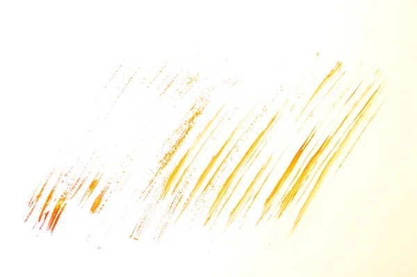 Yellow abstract hand-painted brush stroke daub background over paper — ストック写真