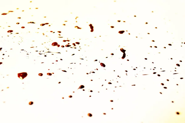Smears of brown paint on a white background. — Stock Photo, Image