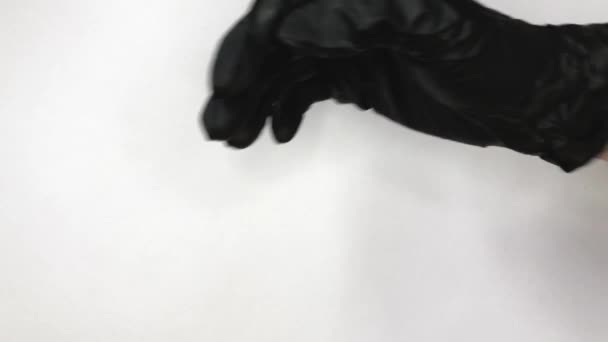 Enlève Des Gants Noirs Sur Fond Blanc — Video