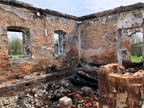 Burned house after fire, ruined building room inside, disaster or war aftermath concept