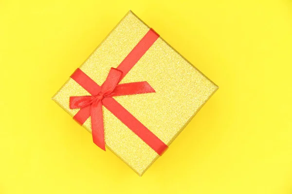 Gold Gift Box Tied Red Bow Holidays Gift Top View — Stockfoto