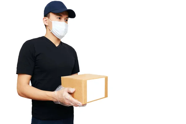 마스크와 인공호흡기를 착용하고 아시아의한 업자는 별도의 배경에 복사본 상자를 배달을 로열티 프리 스톡 이미지
