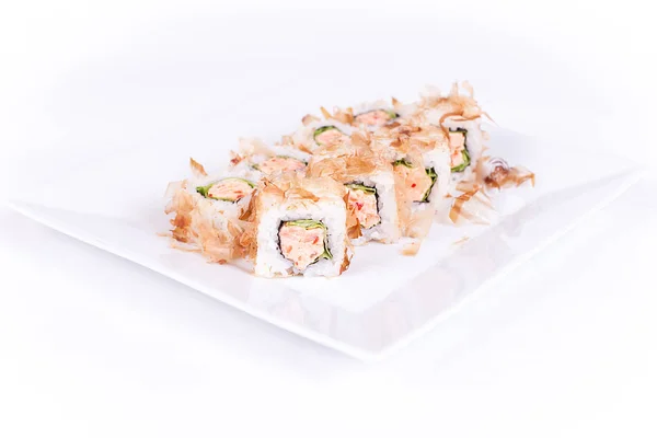 Sushi tallrik på vit bakgrund — Stockfoto