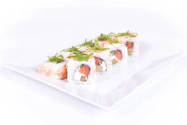 Plato de sushi sobre fondo blanco — Foto de Stock