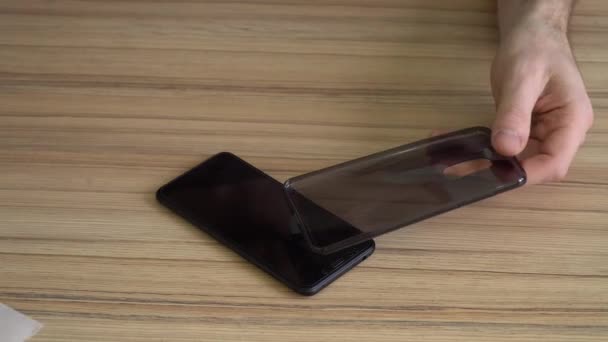 Detail. Silikonové pouzdro a nový mobilní telefon. — Stock video