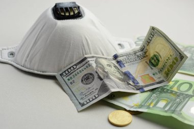 Coronovirüs ve ekonomi. Dolar, Euro ve Kovid-19. Ekonomik istikrar riski. Salgın sırasında Avrupa Birliği ve Amerika Birleşik Devletleri 'ne maddi destek.