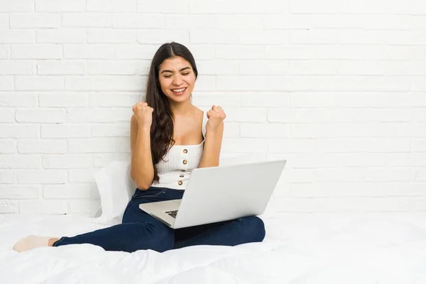 Young Arab Woman Working Her Laptop Bed Cheering Carefree Excited — Stockfoto