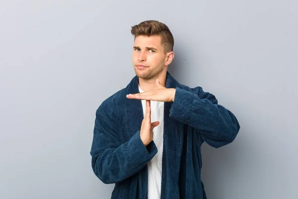 Young Caucasian Man Wearing Pajama Showing Timeout Gesture — Stock Photo, Image