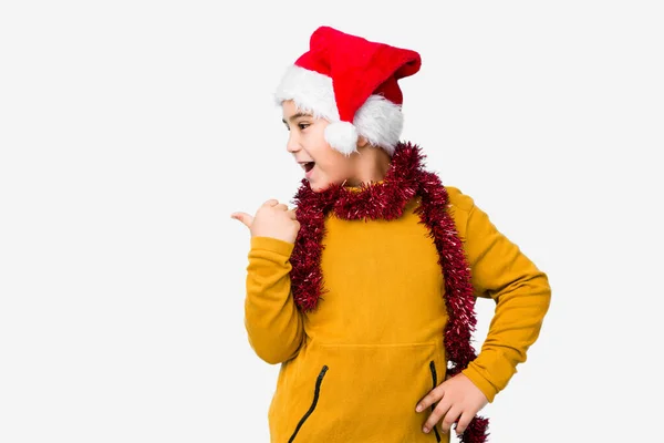 Little Boy Celebrating Christmas Day Wearing Santa Hat Isolated Points — Stock Photo, Image