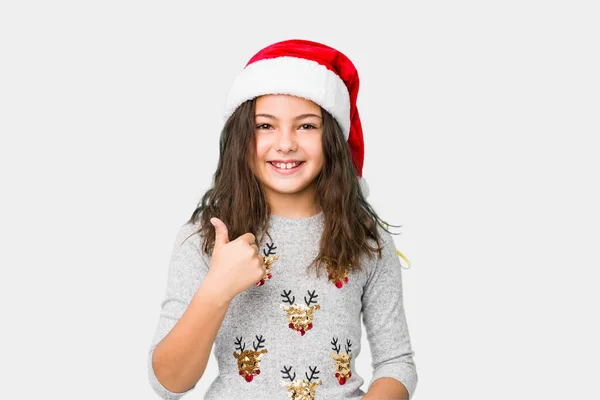 Маленька Дівчинка Святкує Різдвяний День Посміхаючись Піднімаючи Великий Палець Вгору — стокове фото
