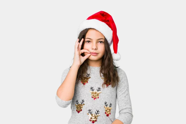 Kleines Mädchen Feiert Weihnachten Mit Fingern Auf Den Lippen Die — Stockfoto