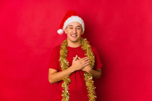 Jovem Dia Natal Tem Expressão Amigável Pressionando Palma Peito Conceito — Fotografia de Stock