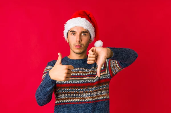 Young Man Christmas Day Joyful Carefree Showing Peace Symbol Fingers — Stock Photo, Image