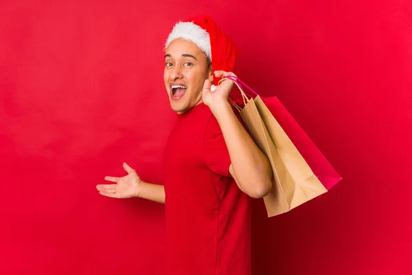 Young Man Holding Gift Christmas Day — Stock Photo, Image