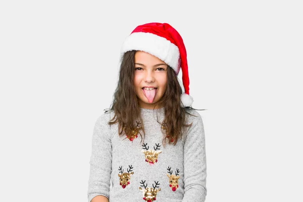 Menina Comemorando Dia Natal Engraçado Amigável Saindo Língua — Fotografia de Stock