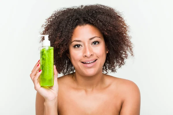 Young African American Woman Holding Aloe Vera Bottle Happy Smiling — Stock Photo, Image