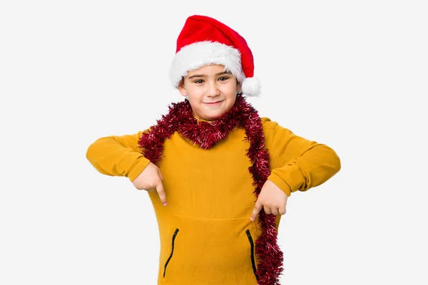 Little Boy Celebrating Christmas Day Wearing Santa Hat Isolated Points — Stock Photo, Image