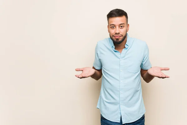 Young South Asian Man Doubting Shrugging Shoulders Questioning Gesture — Stock Photo, Image