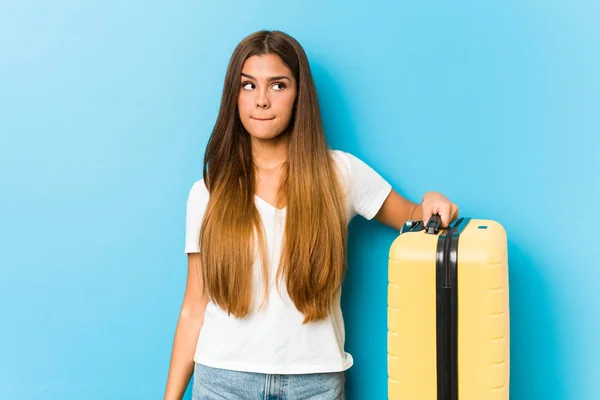 Young Caucasian Woman Holding Travel Suitcase Confused Feels Doubtful Unsure — Stock Photo, Image