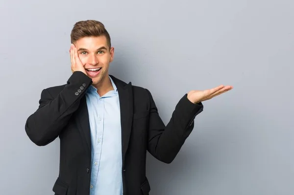 Young Handsome Caucasian Man Holds Copy Space Palm Keep Hand — Stock Photo, Image