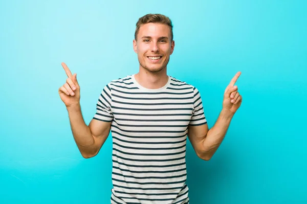Young Caucasian Man Blue Wall Indicates Both Fore Fingers Showing — ストック写真