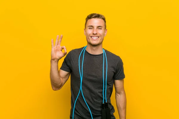 Young Caucasian Man Holding Jump Rope Cheerful Confident Showing Gesture — ストック写真