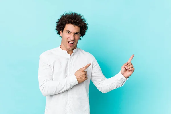 Young Curly Mature Man Wearing Elegant Shirt Pointing Forefingers Copy — ストック写真
