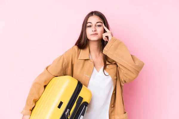 Young Caucasian Traveler Woman Holding Suitcase Isolatedshowing Disappointment Gesture Forefinger — Stock Photo, Image