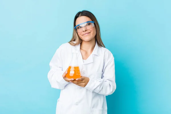 Young scientific woman dreaming of achieving goals and purposes