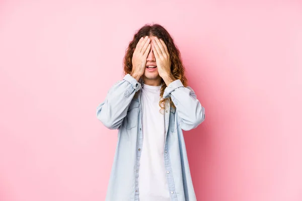 Long Hair Man Posing Isolated Covers Eyes Hands Smiles Broadly — Stock Photo, Image