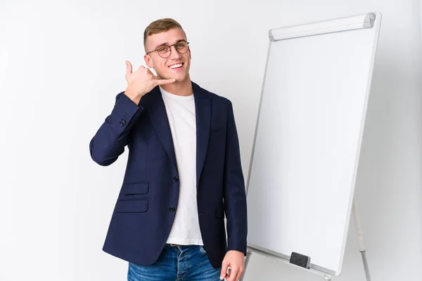 Young Coaching Man Showing White Board Showing Mobile Phone Call — Stock Photo, Image