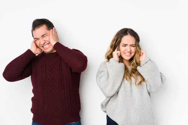 Young Couple Posing White Background Covering Ears Hands — 스톡 사진