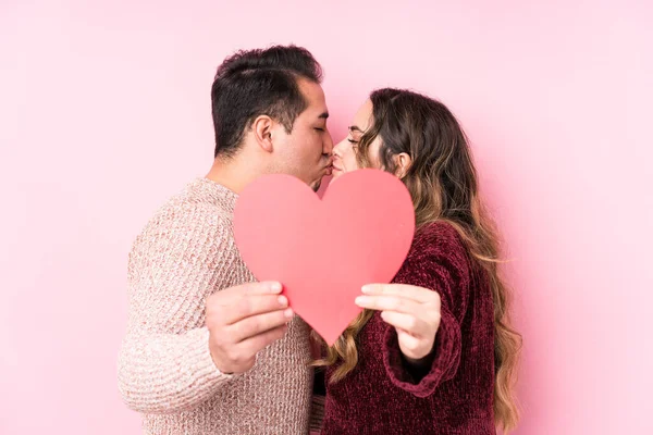 Young Latin Couple Holding Heart Sticker — 스톡 사진