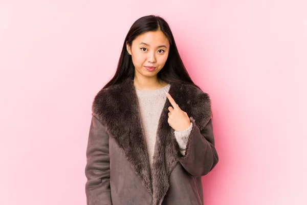 Young Chinese Woman Wearing Coat Isolated Pointing Finger You Inviting — 스톡 사진